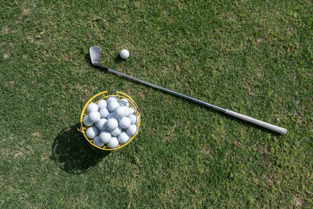 istock Looking down at golf balls and clubs 1396098472