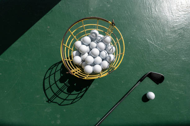 istock Looking down at golf balls and clubs 1396098574