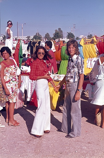 Agadir, Morocco, 1976. Tourists at a bazaar (market) in Agadir.