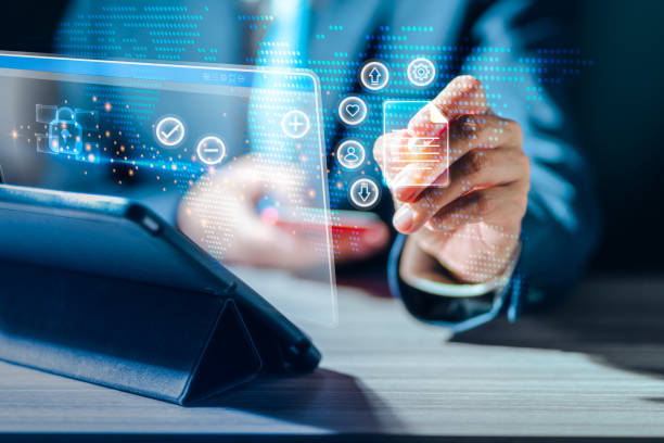istock Businessman is pointing virtual screen application on Laptop Computer, digital marketing, financial, banking and big data 1396099818