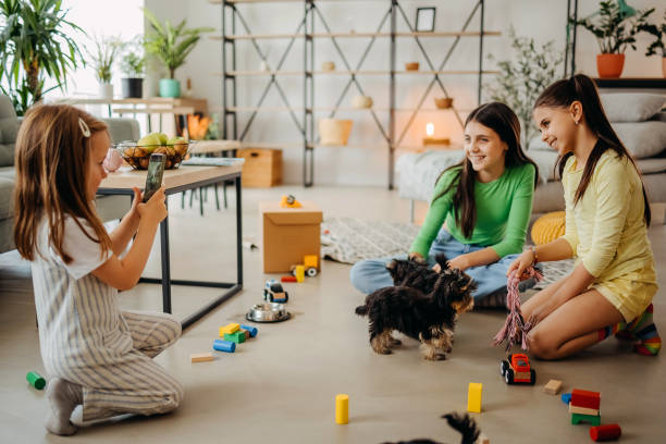 istock Girls and dogs 1396101151