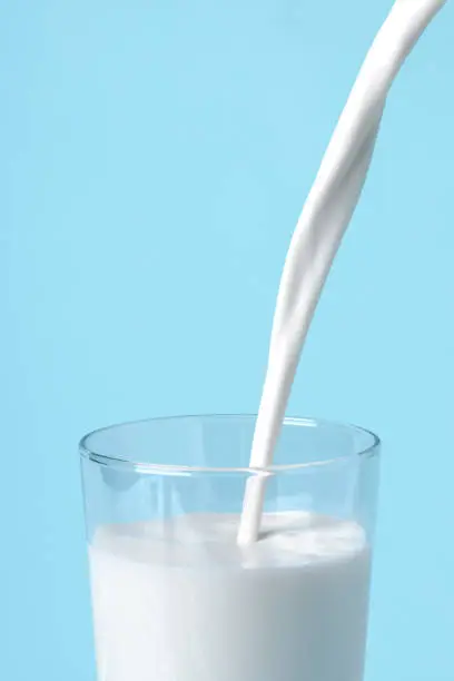 Photo of Milk pours into the glass