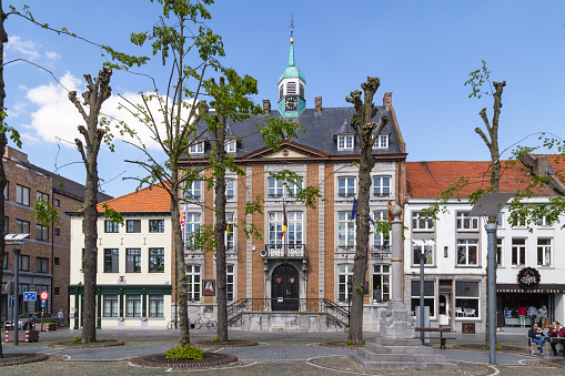 Maaseik, Belgium, May 2, 2018; Town hall of Maaseik on the market square.