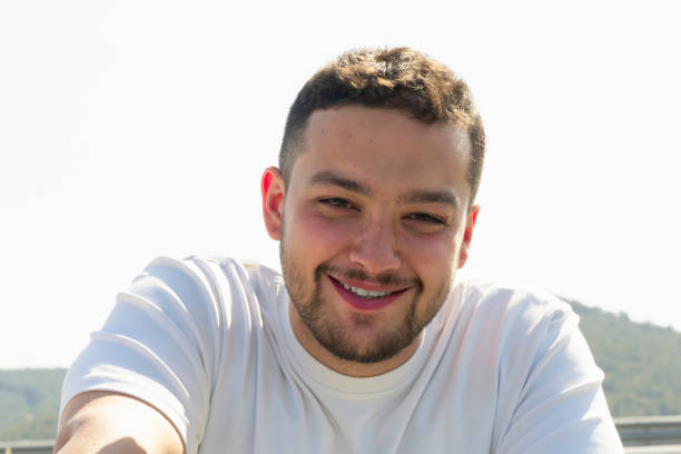 istock Happy smiling man looking at camera 1396110750
