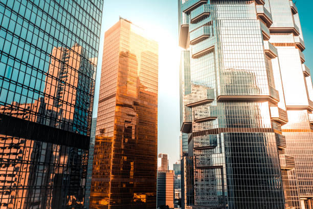 istock Reflections on glass covered corporate building 1396113170