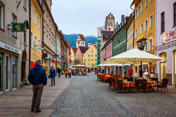 Shopping street in the old town of Fussen Fussen, Bavaria, Germany - April 28, 2013: Shopping street in the old town of Fussen fussen stock pictures, royalty-free photos & images