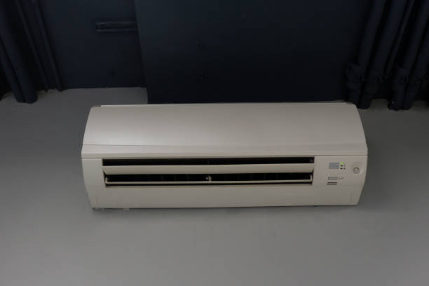 istock front view white wall mounted air conditioner on white and grey wall background, object, technology, decor, fashion, home, office, copy space 1396115725