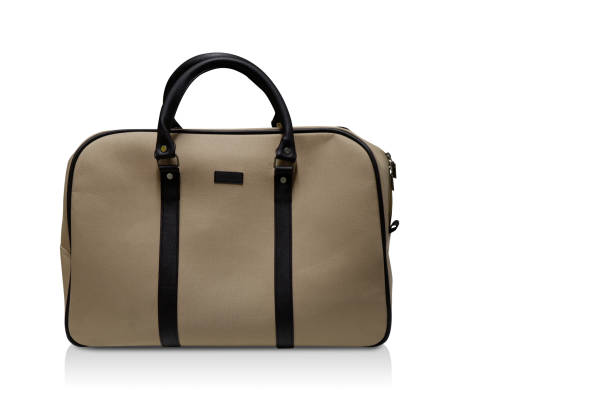 istock front view cream and black suitcase on white background, object, decor, fashion, gift, copy space 1396115732