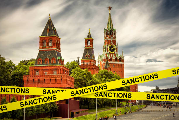 istock Sanctions caution tape at Moscow, Russia 1396120192