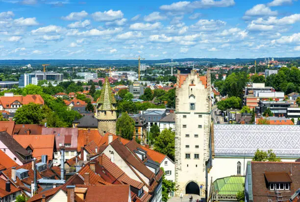 Panorama of Ravensburg, Baden-Wurttemberg, Germany, Europe. Aerial view of houses of Ravensburg city in summer, Frauentor tower sight. Skyline of old Swabian town in Alpine green valley.