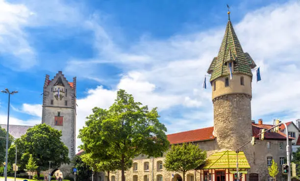 Ravensburg in summer, Baden-Wurttemberg, Germany, Europe. View of medieval Frauentor and Gruner towers, historical landmarks of city. Old buildings in Ravensburg downtown. Travel in Germany concept.