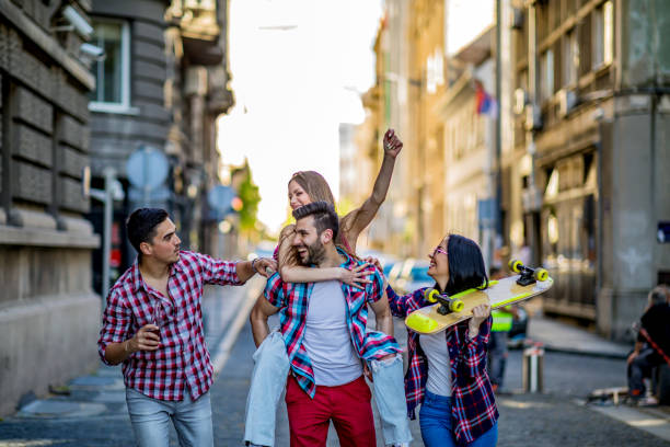 istock Group of friends drinking beer together 1396120626