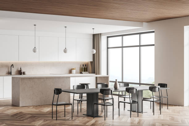 istock Light kitchen set interior with eating table and seats, countertop and window 1396122132