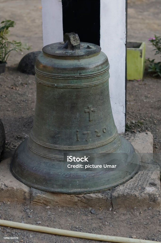 Church bell of vintage Diu Fort. Bastion of Diu Fort. It is a sixteenth century fort. built by Portuguese, located in Diu district of Union Territory Daman and Diu, India. Selective focus Ancient Stock Photo