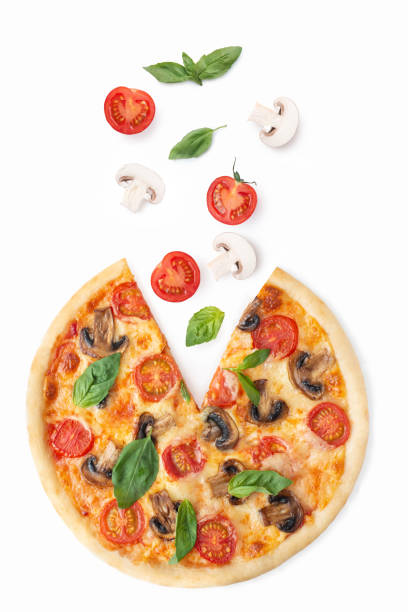 istock Pizza with mushrooms, tomatoes, cheese and basil on a white background. Falling ingredients. Levitation 1396133514