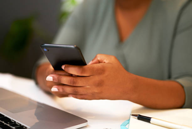 istock Close up of business woman's hands using smartphone. Woman using cellphone to send a text, check messages or chatting on social network 1396138024