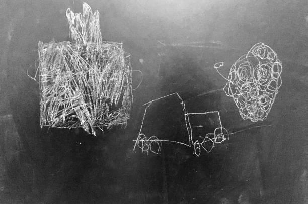 istock Abstract Chalk Scribbles on Blackboard  as stock photo 1396142265