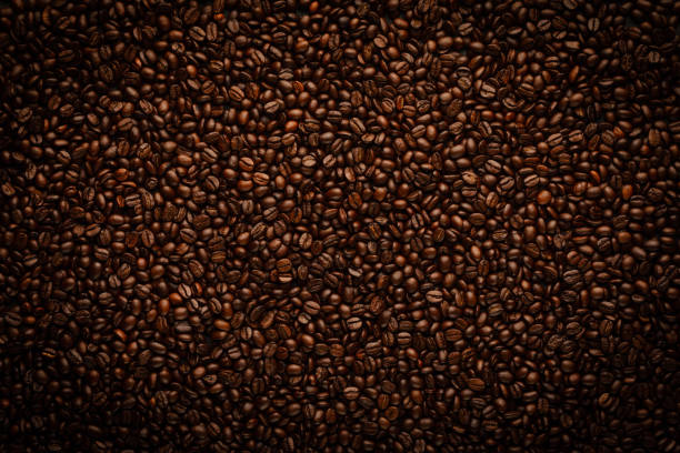 ダークブラウントーンの焙煎コーヒー抽象的な背景