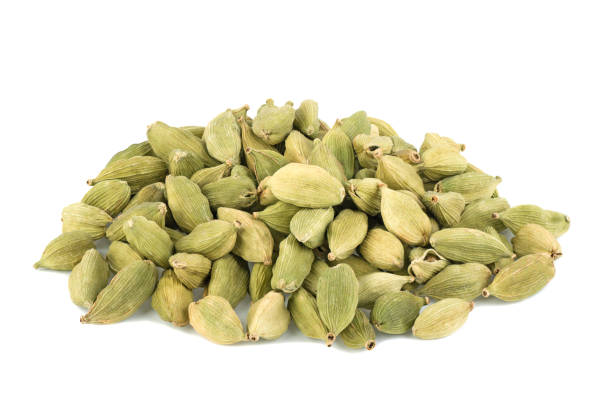 istock Cardamom pods and seeds isolated on white background 1396144442