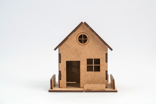 Miniature models of buildings on white background