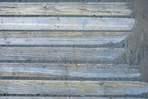 wooden floor at the sandy beach