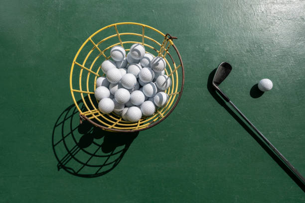 istock Looking down at golf balls and clubs 1396151674
