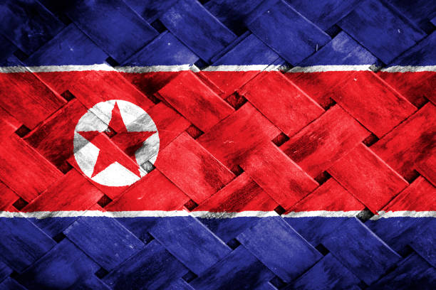 istock north korea flag screen on wicker wood background 1396153239