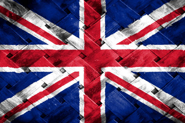istock united kingdom flag screen on wicker wood background 1396153856