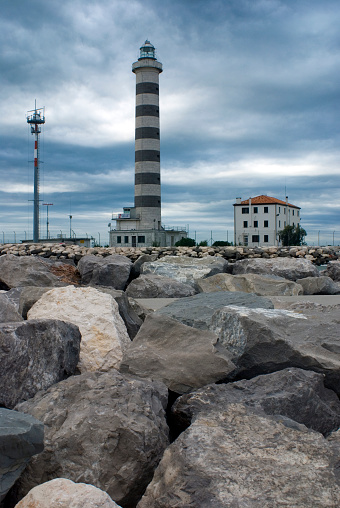 Stormy sky above the lighthouse of Lido di Jesolo, Veneto, Italy, Europe