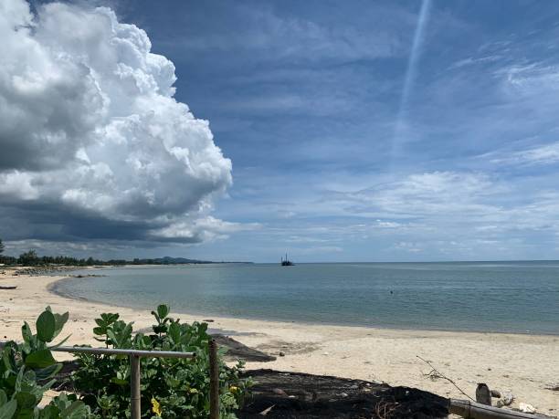 istock A huge rain cloud is covering the sky. 1396154687