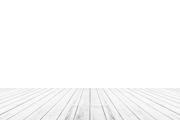 istock Empty white wooden table top isolated on white background 1396160734