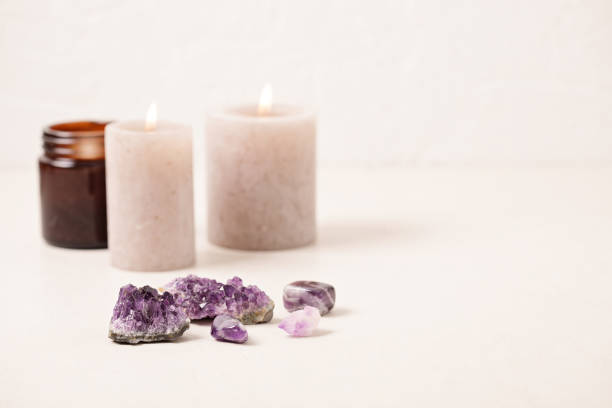 istock Healing reiki chakra crystals therapy. Alternative rituals with amethyst for wellbeing, meditation, relaxation, mental health, spiritual practices. Energetical power concept 1396160843