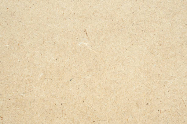 istock Old brown recycle cardboard paper texture background 1396160954