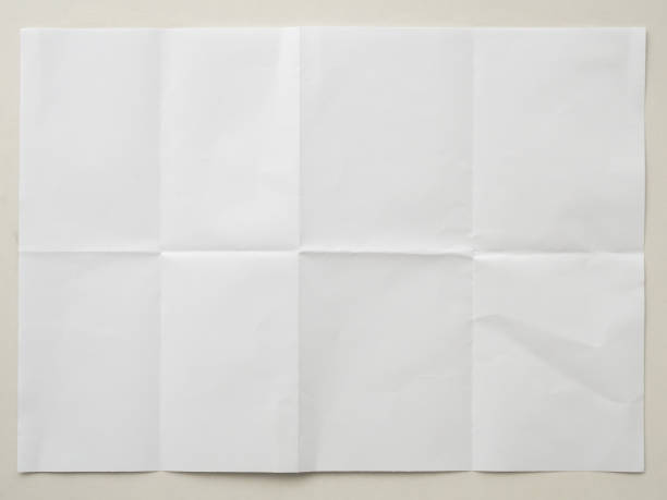 istock White folded and wrinkled paper on white background 1396161233