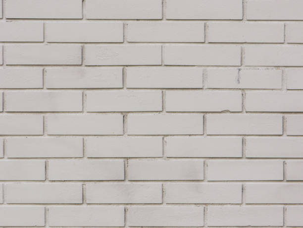 istock Close-up shot of a grey brick wall. 1396161426