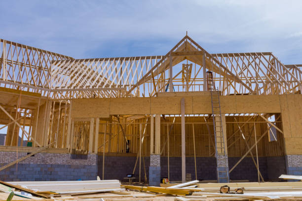 istock Framed residential home with construction of a timber frame house 1396163186