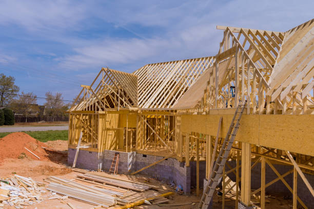 istock Home construction the frame of house beginning of roofing construction 1396163187