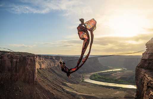 Woman prepping for Aerial Silks in Moab, Utah