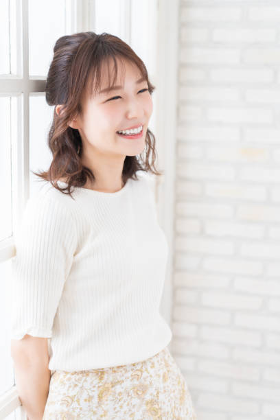 istock attractive asian woman relaxing 1396170219