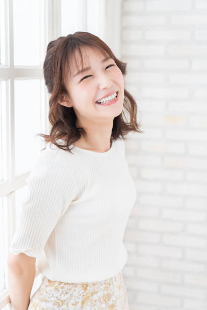 istock attractive asian woman relaxing 1396170257
