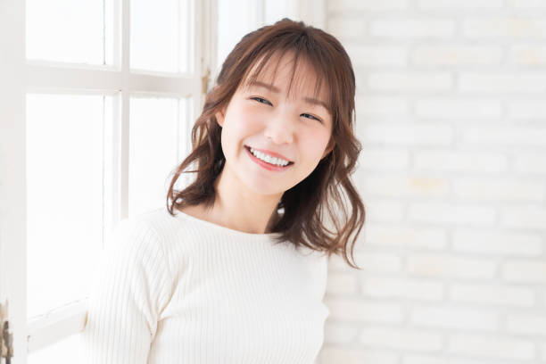 istock attractive asian woman relaxing 1396170286
