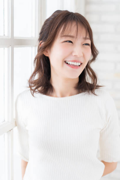 istock attractive asian woman relaxing 1396170328