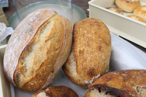 istock Bread close-up. Freshly baked sourdough bread with a golden crust  . Concept bakery , texture sourdough bread 1396174859