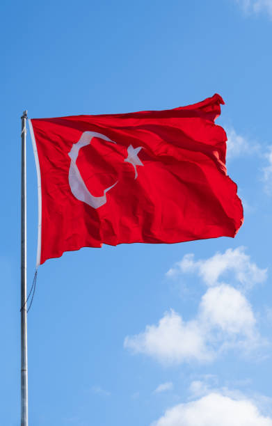 istock Turkish flag waving in the blue sky, flagpole, 1396178186