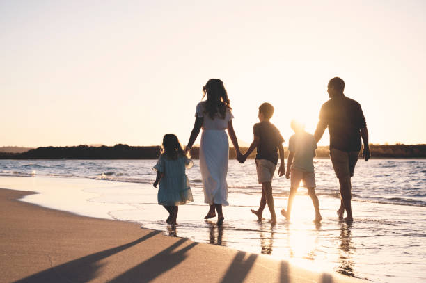 istock Beautiful family together at sunset 1396179714