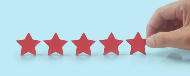 istock Rise on increasing five stars in human hand 1396189520