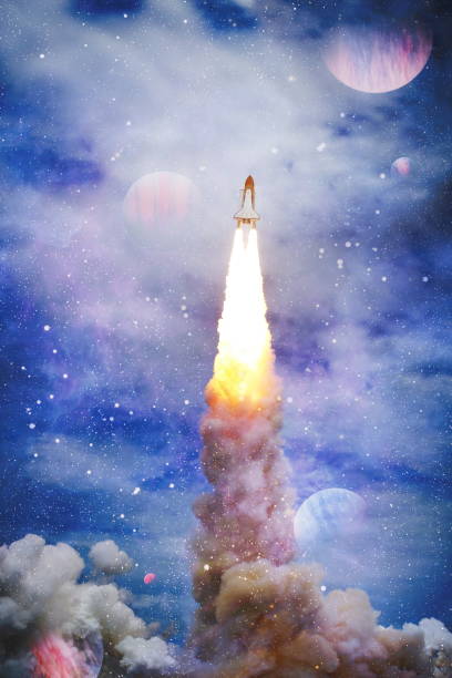 istock Spaceship flight.Space shuttle launch in the clouds to outer space. Dark space with stars on background.  Elements of this image furnished by NASA 1396190611