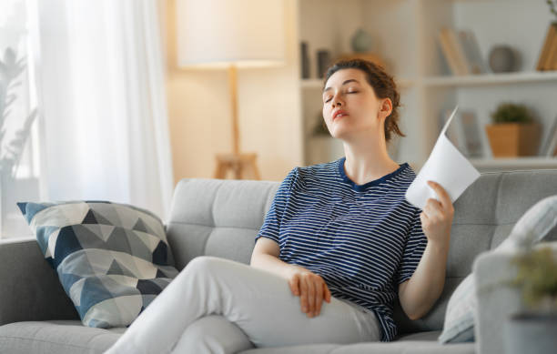 istock woman fanning herself 1396191612