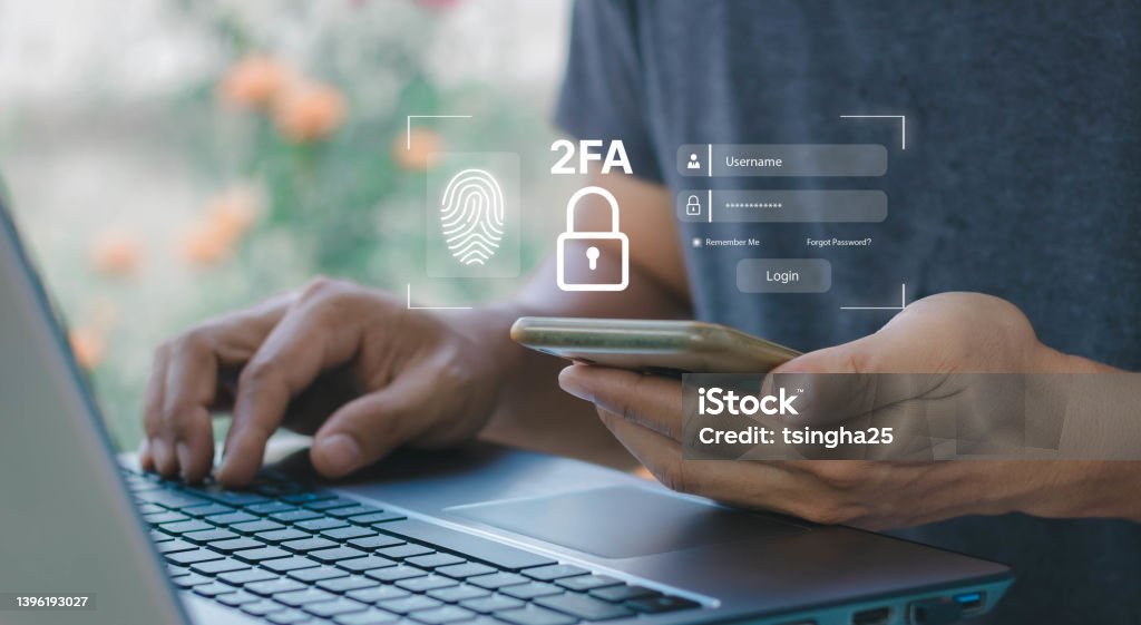 Businessman using a laptop login protection with 2FA, Two-Factor Authentication, Cybersecurity privacy protect data. internet network security technology. Personal online privacy. Cyber hacker threat. Digital Authentication Stock Photo