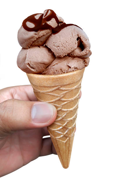 istock A man hand holding an ice cream cone on a white background 1396195911